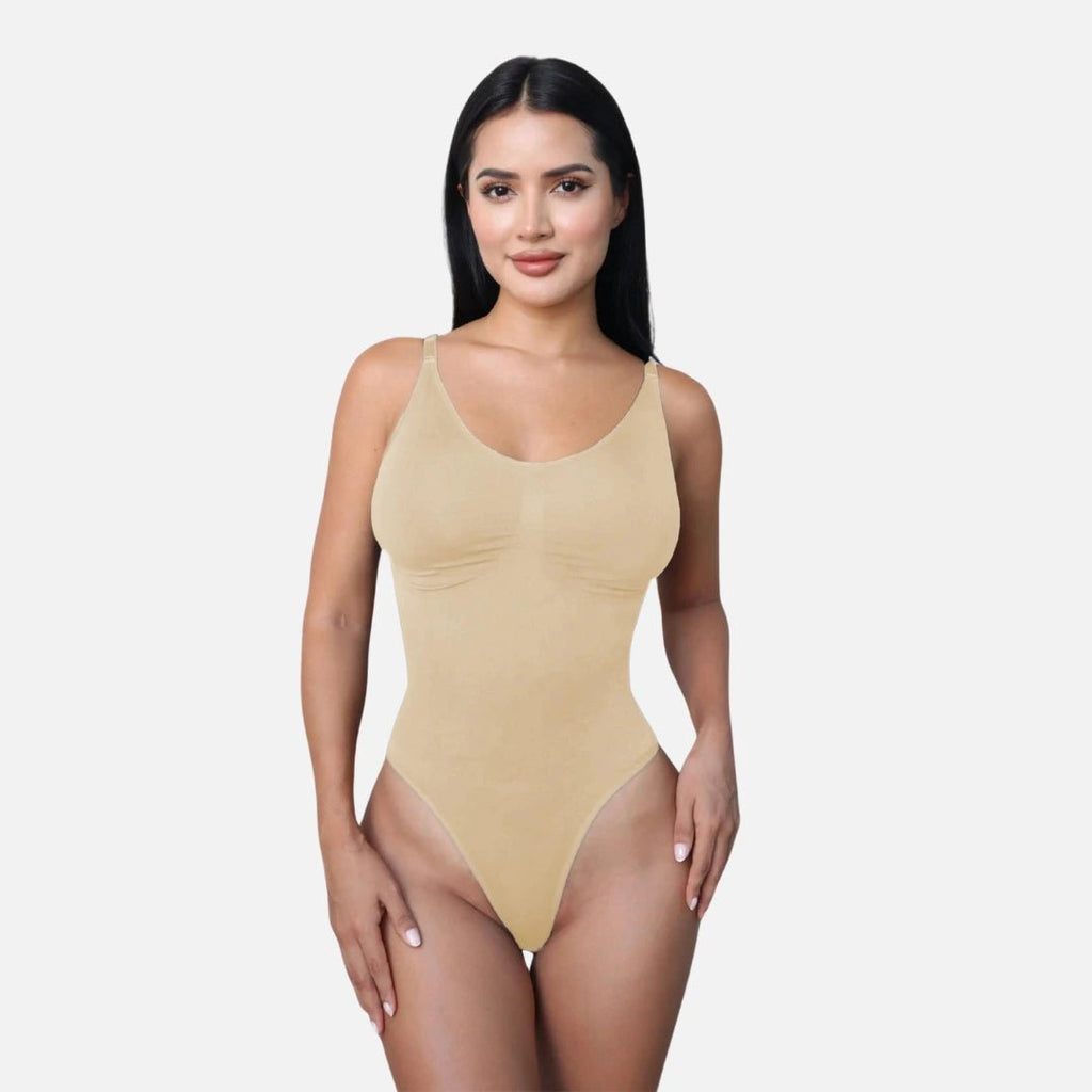 How good does the Butter Sclupt ™️ Short Sleeve Shapewear Bodysuit for a  cute model off duty look?! We are loving this quiet luxury trend…